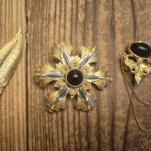 Gold and Silver Brooch with Black Center